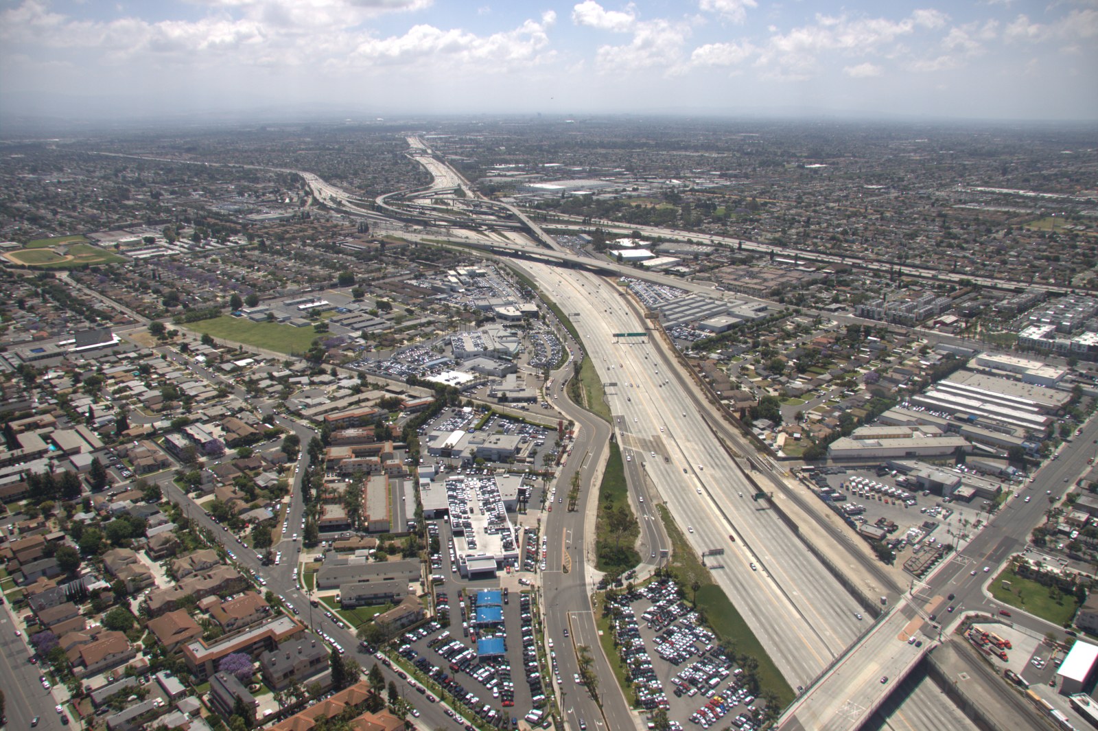 Aerial view of Orange County, California, showing the freeway system connecting the communities OSSUM IT serves
